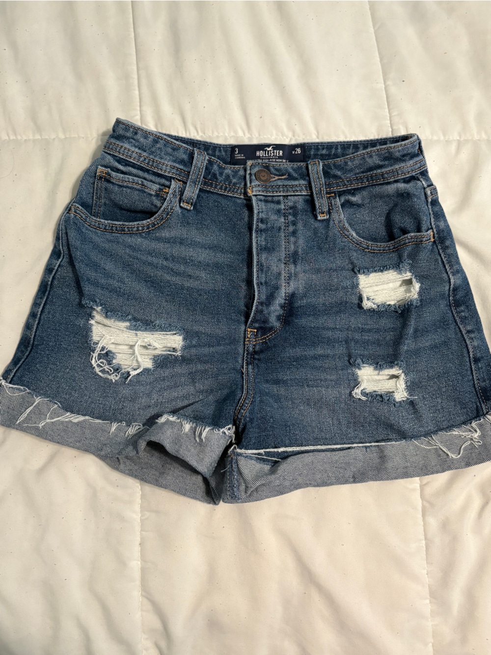 Hollister Rolled Hem Distressed Denim Shorts in Blue